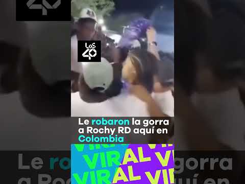 Casi le roban la gorra a Rochy RD en Colombia