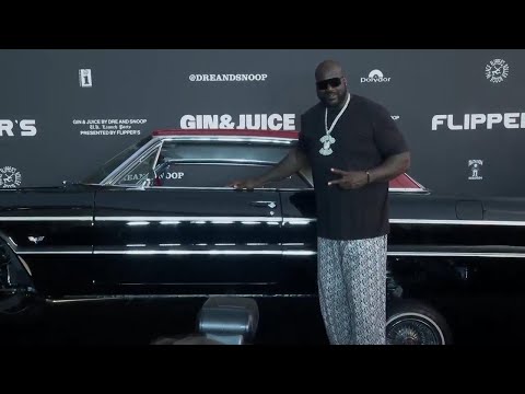 Dr. Dre and Snoop Dogg launch their Gin & Juice cocktails at a roller-skating rink with celebrity fr