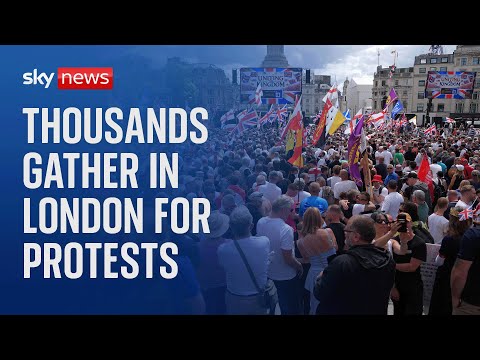 Crowds gather in London for rival protests led by Tommy Robinson and Jeremy Corbyn