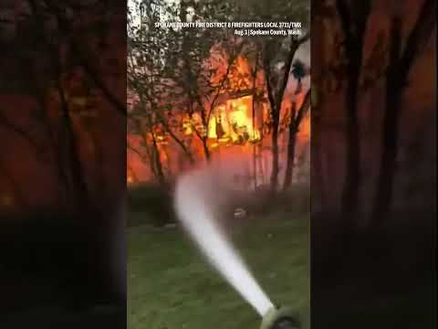 Firefighter camera captures effort to stop flames
