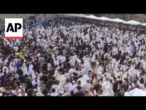 Jewish worshippers gather at Jerusalem's Wailing Wall for traditional priestly blessing