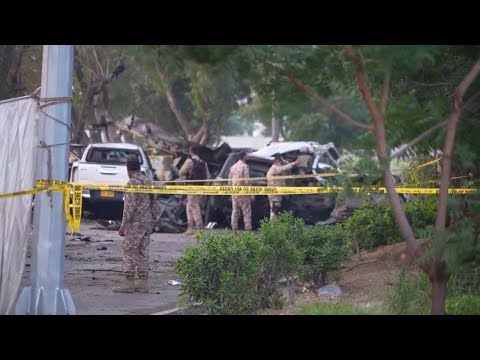 Security at scene on morning after an explosion outside airport in Karachi kills 2