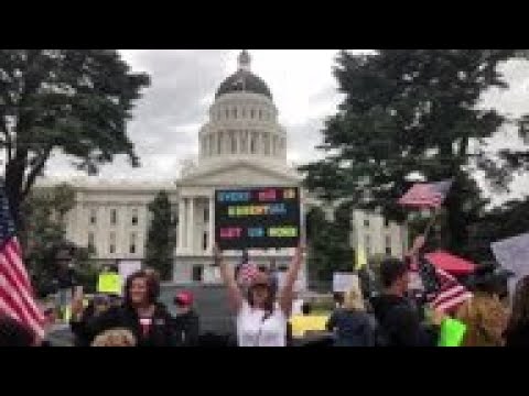 Calif. protests push reopen, Newsom urges caution