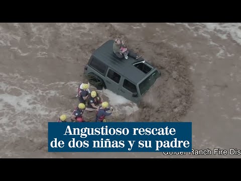 Angustioso rescate de dos niñas y su padre atrapados en medio de una riada