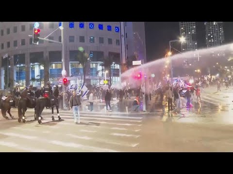 Police use water cannon to disperse anti-government protesters in Tel Aviv