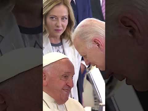 Biden embraces surprised-looking Pope Francis with forehead-to-forehead hug at G7 summit #shorts