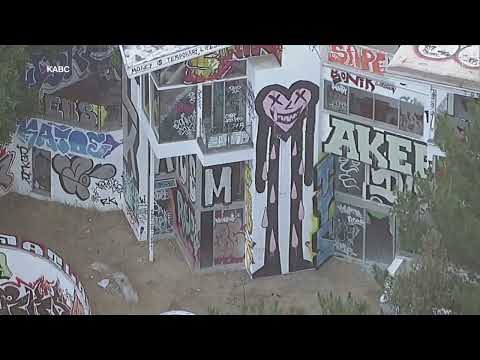 Abandoned Hollywood Hills mansion covered in graffiti, taken over by taggers and squatters