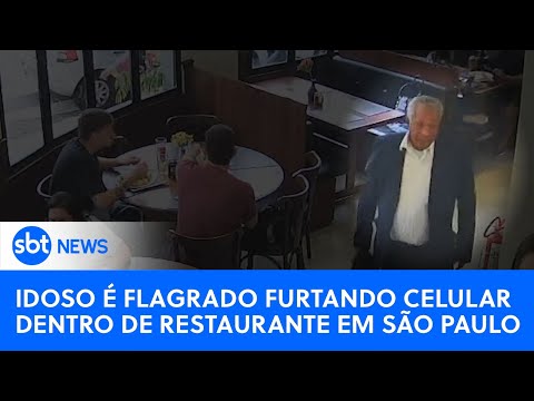 SP: Homem de terno é flagrado furtando celular de dentro de bolsa em restaurante