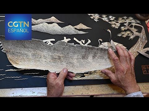 Grupo étnico Hezhe de China preserva la tradición centenaria de fabricar ropa con piel de pescado