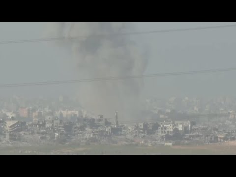 Explosions seen inside Gaza border as Israeli troops surround Gaza City