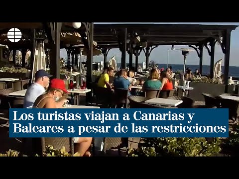 Los turistas extranjeros viajan a Canarias y Baleares a pesar de las restricciones