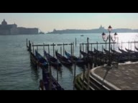 Venetian gondolas glide to a halt, as pandemic continues