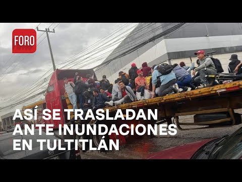 Vehículos de carga trasladan a peatones atrapados en inundación en Tultitlán, Edomex - Las Noticias