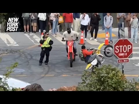 Video shows unruly, masked motorcyclists circling San Francisco traffic cop