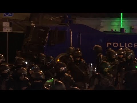 Police in Tbilisi disperse demonstrators outside Georgia's parliament