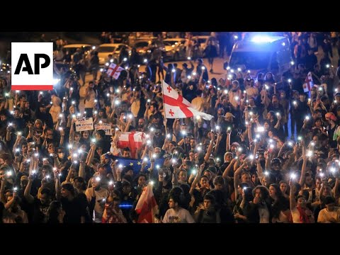 Georgian protesters against 'Russia-style' media law mark Orthodox Easter with candlelight vigil