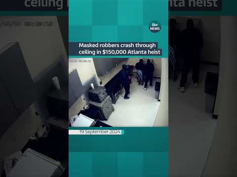 Two masked robbers crashed through the ceiling of a shop in Atlanta and stole $150,000 (113,000)
