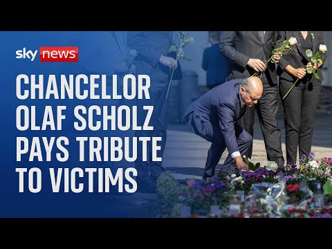 German Chancellor Olaf Scholz pays tribute to victims of festival stabbing
