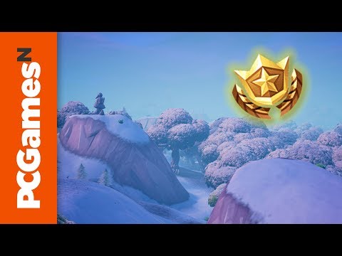 Fortnite search between a hatch a giant rock lady and a precarious flatbed