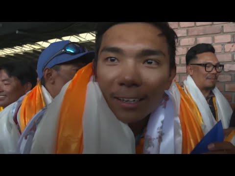 Record-breaking teen climber returns to hero's welcome in Nepal