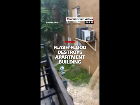 Flash flood destroys apartment building