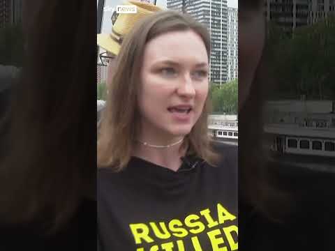 Demonstrators gather to honour Ukrainian athletes killed in war