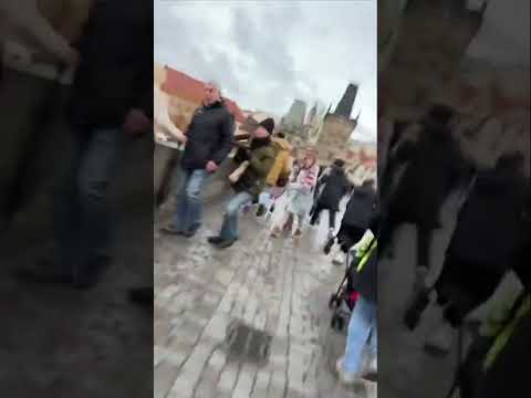 People flee during shooting in Prague
