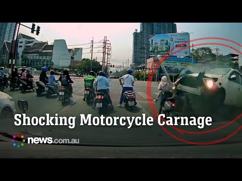 Driver crashes into row of motorcycle riders waiting at red light