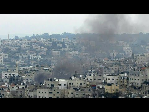 Smoke billows after explosion in Jenin camp as Israel presses large-scale operation | AFP