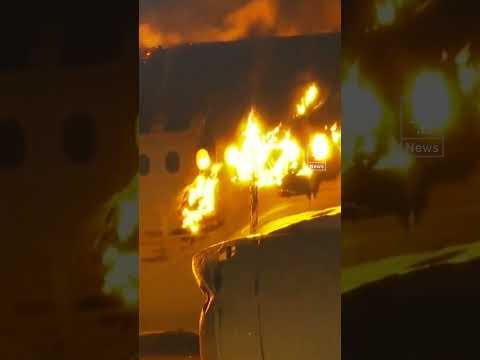 Plane on fire in Japan airport