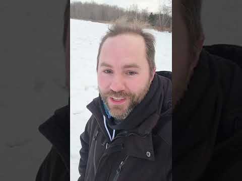 Walking on top of a frozen river.