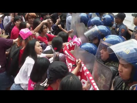 Activists march through Manila on International Women's Day to protest gender violence