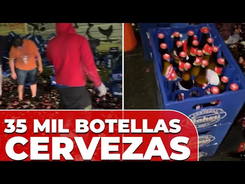 Un CAMIÓN CARGADO con 35.000 botellines de CERVEZA vuelca en CANTABRIA