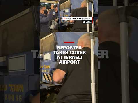 Reporter takes cover at Israeli airport