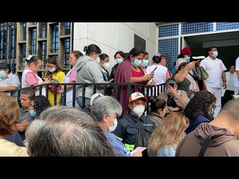 People evacuated from building in Guatemala City following earthquake | AFP