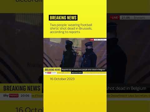 Manhunt after two people 'wearing football shirts' shot dead in Brussels - reports