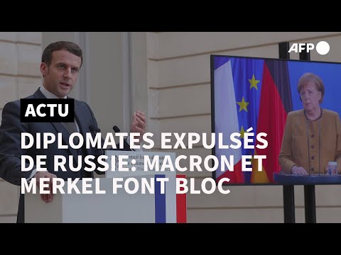 Des diplomates européeens expulsés de Russie, Macron et Merkel font bloc | AFP