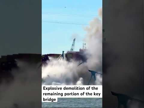 Explosive demolition of the remaining portion of the key bridge