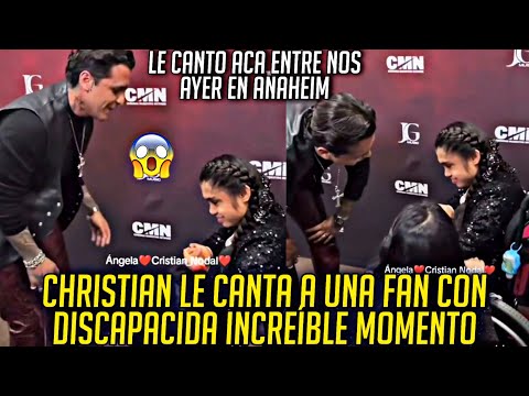 CHRISTIAN LE CANTA A UNA FAN EN SILLA DE RUEDAS ANTES DE COMENZAR SU CONCIERTO DE AYER EN ANAHEIM