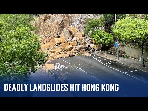 Hong Kong: Clean-up begins after record rainfall kills two, leaving others without running water