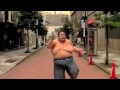 Sumo Wresler running in Ultra-slow motion