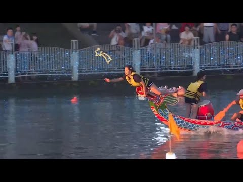 Taiwan nighttime dragon boat racing puts modern twist on ancient tradition