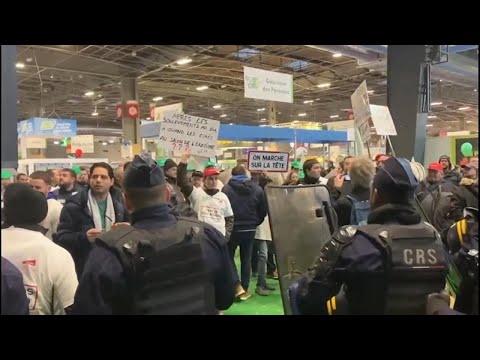 Farmers protest at French farm fair venue with President Macron due to visit