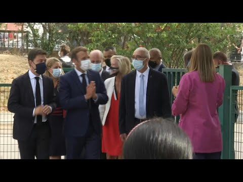 Emmanuel Macron arrive une école de Marseille | AFP Images