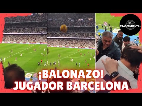 AFICIONADO DEL REAL MADRID RECIBE UN PELOTAZO DE UN JUGADOR DEL FC BARCELONA