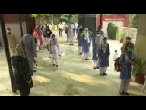 Pakistan schools reopen as virus cases decline
