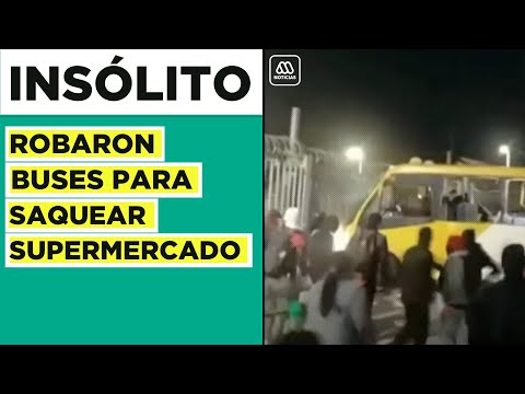 Turba robó buses para derribar los accesos a supermercado en Puente Alto