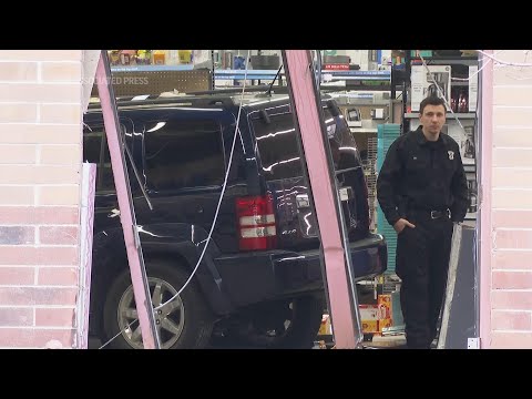 An SUV crashed into a Walmart in suburban Detroit, injuring 5 people, police say