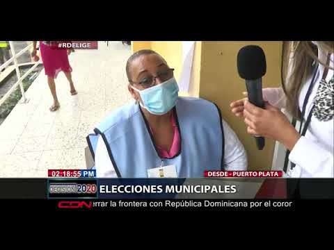 Las personas toman precaución de conavirus  durante elecciones municipales en Puerto Plata