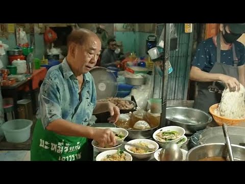 Pandemic lockdowns take a bite out of Bangkok's street food sellers' earnings